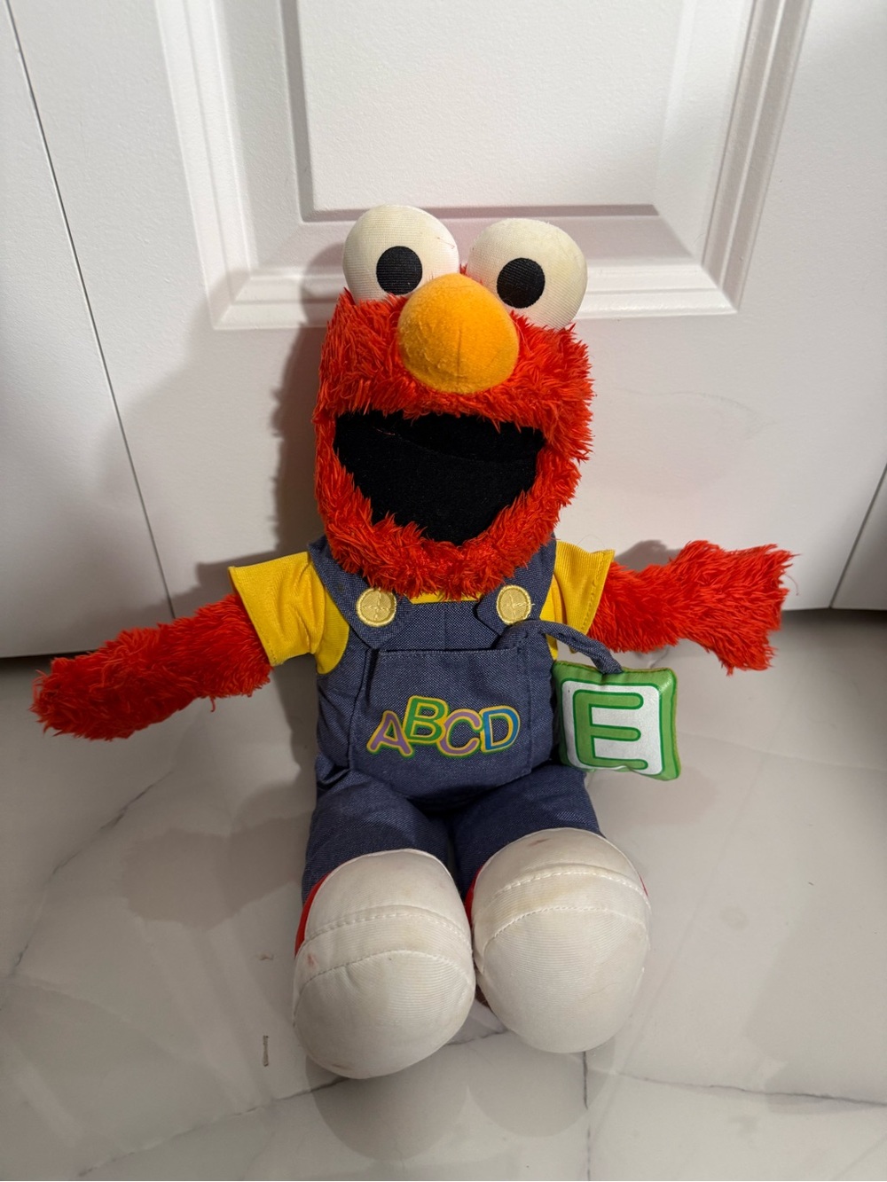 Sesame Street Elmo Plush Toy in Red with ABCD Overalls